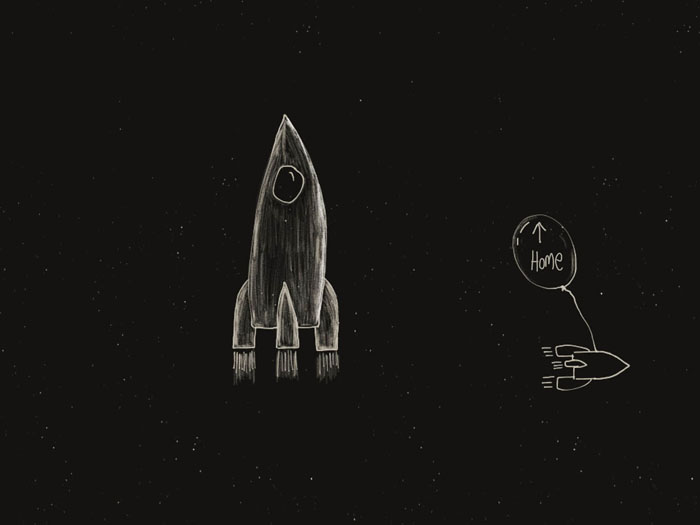 A simple drawing of a rocket with another small rocket next to it, attached to a balloon that says 'home'