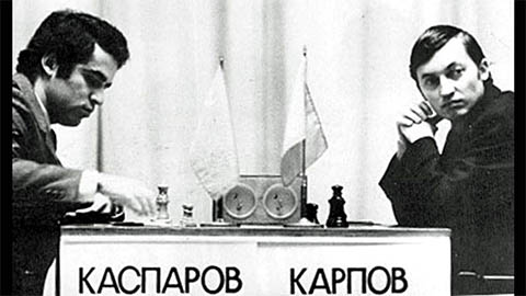 A picture of chess players Kasparov and Karpov playing a game of chess at a young age