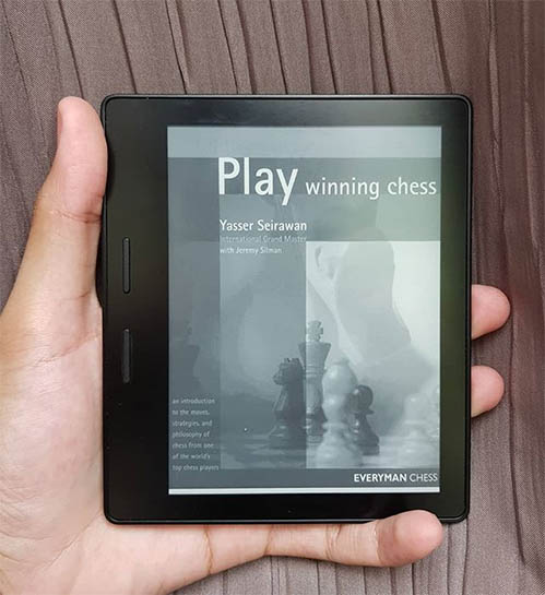 A picture of a Kindle with the cover of Planning Winning Chess book on display.